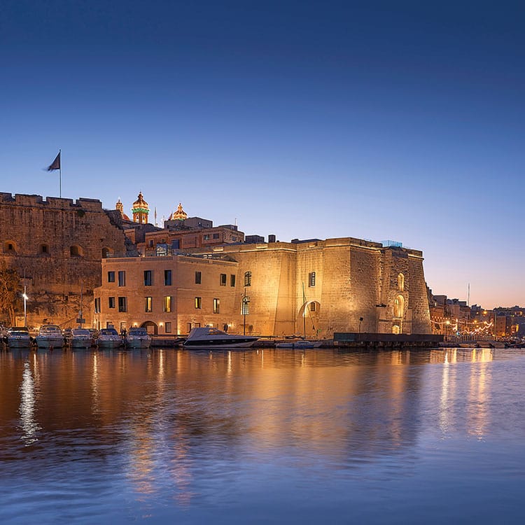 Night and outside view of Cugo Gran Macina Grand Harbor from the harbor of Valletta, best boutique hotels in Europe